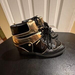 Michael Kors  size 8.5 Nikki black and gold high top sneakers